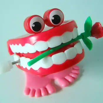 Подарки для маленьких Болтающих детей Забавная пластиковая Заводная игрушка В форме ходячих зубов Заводная игрушка В форме Розы